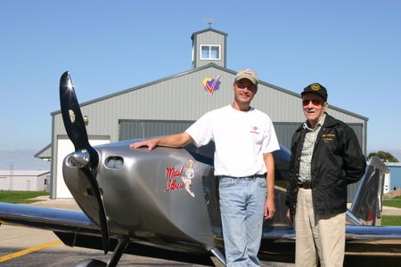 The author with Bill Brennand and Metal Illness, his homebuilt Sonex, in Oshkosh, 2007. 