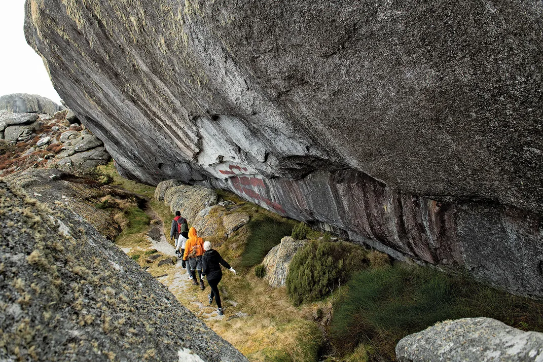 The trek to Sapitwa includes rock slabs, narrow ridges and protected formations like this one 165 feet from the top.