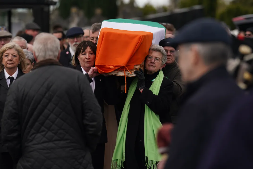 Pallbearers carry Dugdale's casket to the Crematorium Chapel in Glasnevin, Dublin, for her March 27, 2024, funeral service.