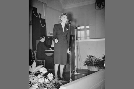 Vera Lynn performing a lunchtime concert at a munitions factory in 1941.