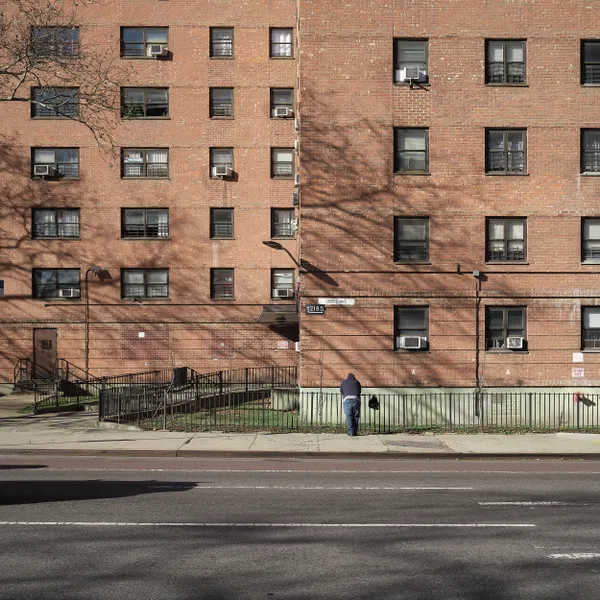 untitled (man leaning on fence) thumbnail