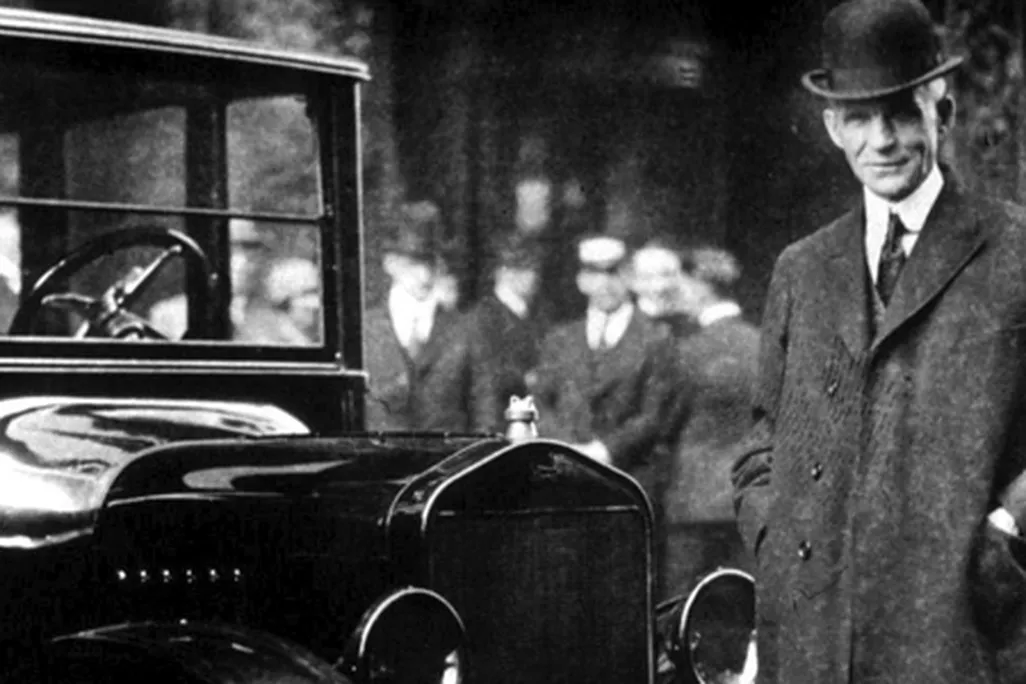 Henry Ford (with a Model T in Buffalo, New York, in 1921)
