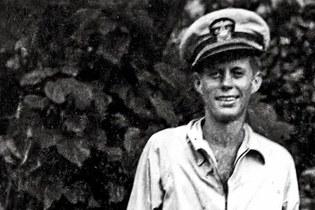 John F. Kennedy, with cane in the Pacific, 1943, would later downplay his PT-109 role: "It was involuntary," he quipped. "They sank my boat."