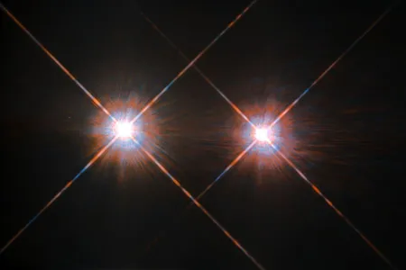 Our stellar next-door neighbors, Alpha Centauri A (left) and B, shine brightly in this Hubble Space Telescope image.