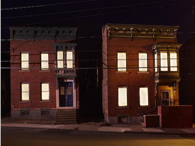 These seemingly inhabited buildings are actually vacant properties illuminated by the new Breathing Lights project in three New York cities.
