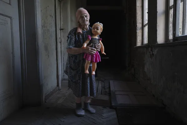 A Life Suspended in the Shadows of War thumbnail