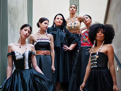 Norma Baker–Flying Horse (third from left) with models wearing her Red Berry Woman designs. Paris Fashion Week, March 2019. (Ulla Couture Photography)