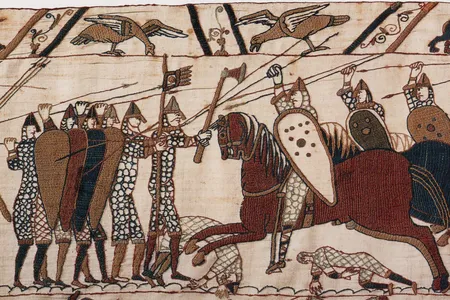 Mounted Normans attack the Anglo-Saxon infantry during the Battle of Hastings, as portrayed on the Bayeux Tapestry. 