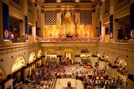 Visitors enjoying the sounds of the Wanamaker Organ in the Grand Court at Macy's in Philadelphia. 