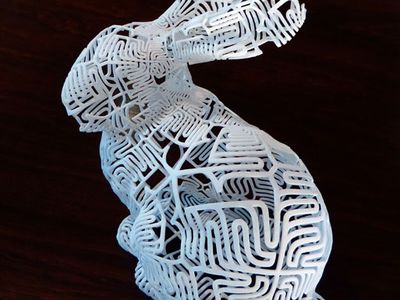 “Bunny” Bunny, by Henry Segerman and Craig Kaplan. The pattern on the bunny consists of copies of the word “bunny.” Listen as the artist describes the sculpture in this YouTube video.