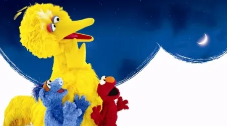 Big Bird and the gang star in "One World, One Sky" at the planetarium