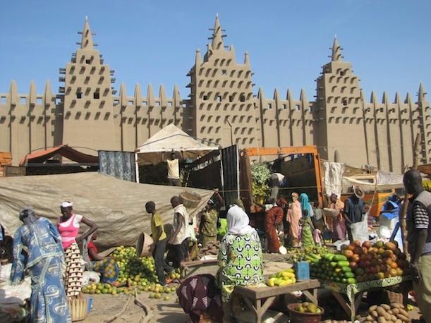 Malians gather in front of the Great Mosque for a regional market every Monday.