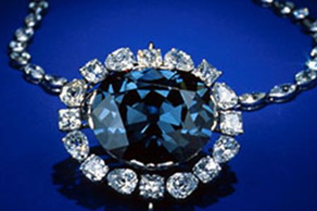 Jeweler Harry Winston donated the famous Hope Diamond—the largest-known deep blue diamond in the world—to the Smithsonian Institution in 1958. It arrived in a plain brown package by registered mail, insured for one million dollars. Surrounded by 16 white pear-shaped and cushion-cut diamonds and hanging from a chain with 45 diamonds, the rare gem attracts 6 million visitors a year to the Natural History Museum.