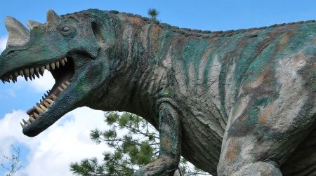 What would life be like if dinosaurs such as this Ceratosaurus (at Ogden, Utah's Eccles Dinosaur Park) suddenly returned?