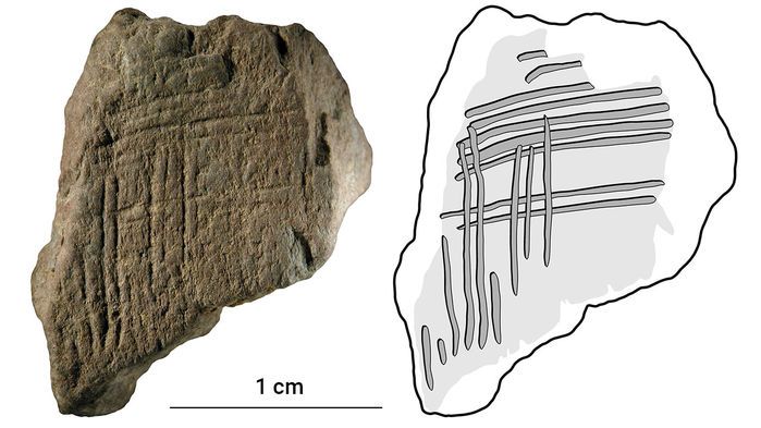 Blombos_Cave_engrave_ochre_1.jpg