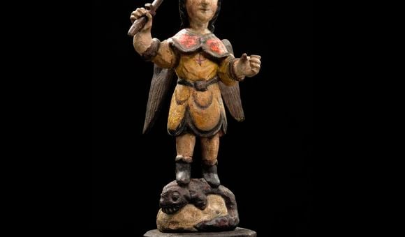 Carved wooden figure of San Miguel en Lucha con el Demonio