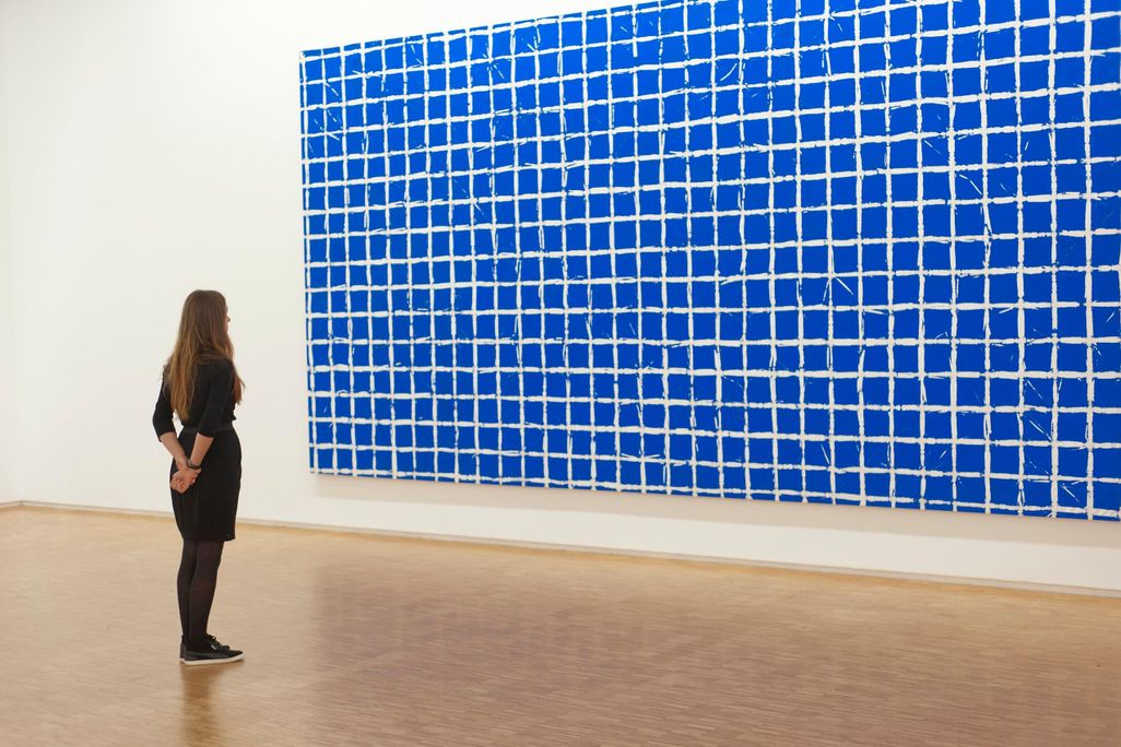 Woman Looking at Painting