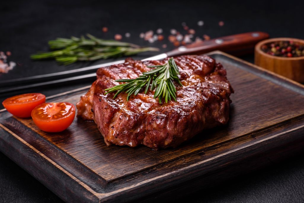 a serving of steak on a board