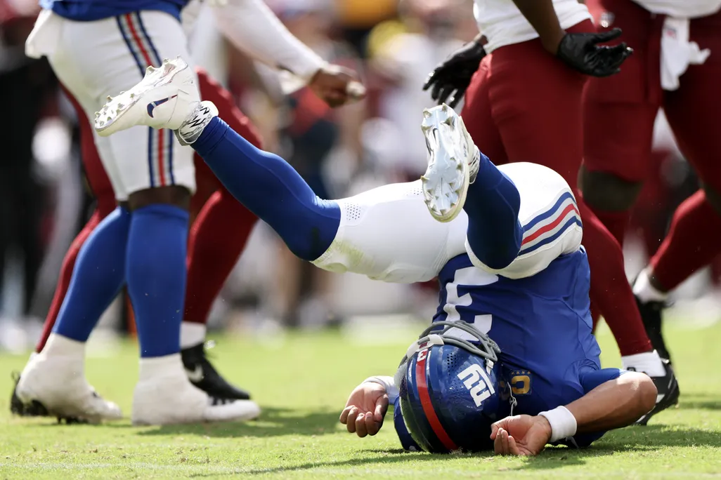 an nfl player lands on his head