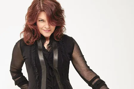 Rosanne Cash, the daughter of Johnny Cash, is not a country and western singer in the tradition of her famous father. She's American music's theoretical physicist of love.