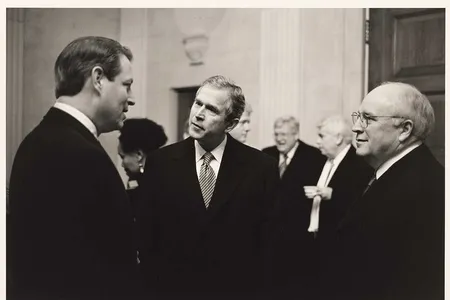 Vice President Al Gore, with President George Bush and Vice President Richard Cheney