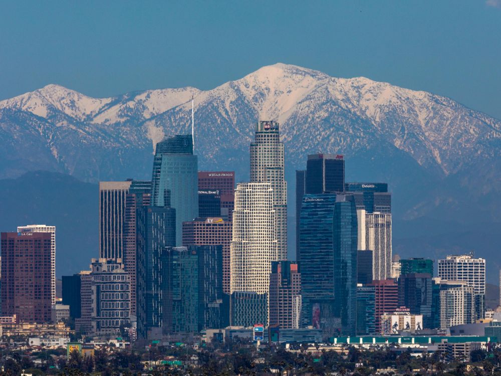 Reduced traffic in Los Angeles reveals a clear view of the San Gabriel Mountains beyond downtown.