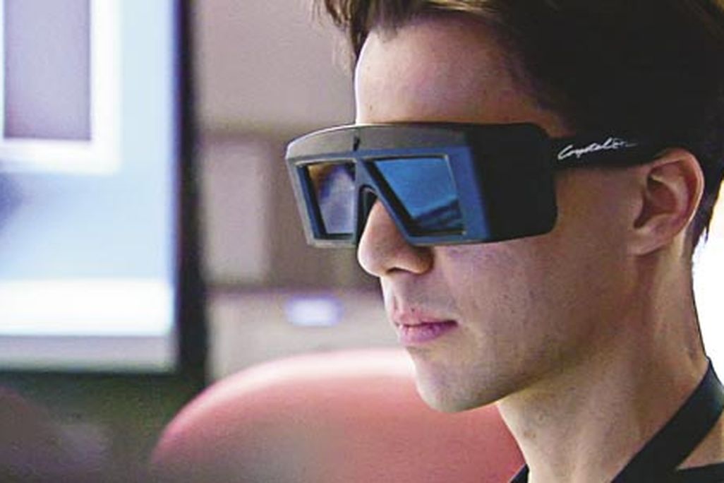Driver Scott Maxwell uses 3-D goggles