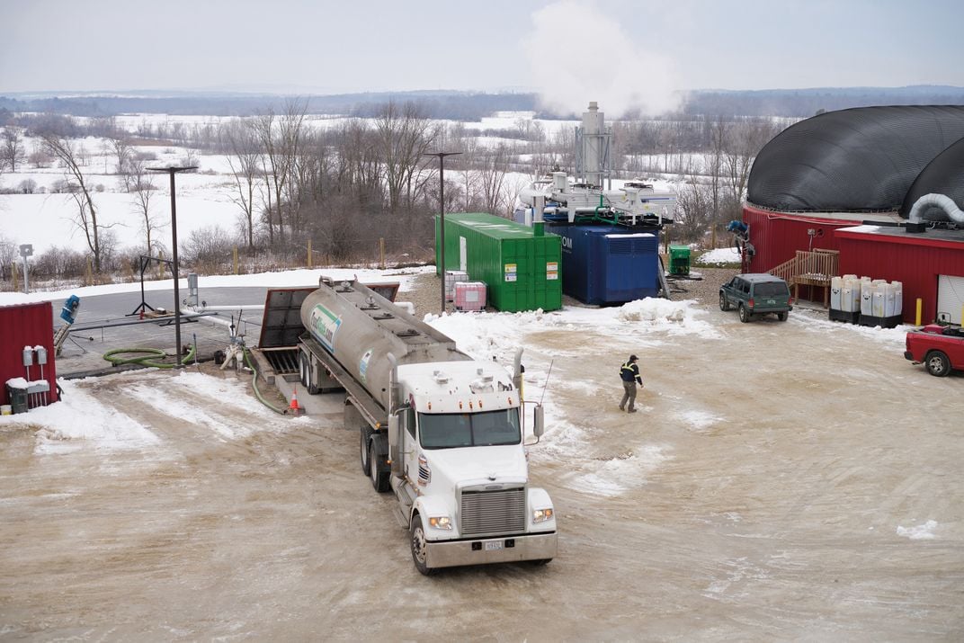 A load of waste material from a milk company, delivered to Goodrich Farm, is poured into the hydrolyzer, the first step in the digestion process.