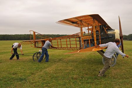 Javier Arango (right) helps escort a SPAD XIII, built by Roger Freeman of Vintage Aviation Services in Texas.