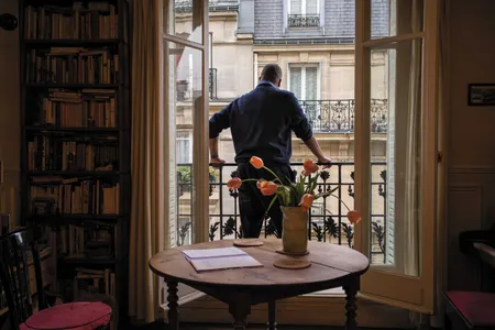 American-born novelist and playwright Jake Lamar says of living in Paris that life's easier when he gets in an elevator and "no one's clutching her purse."