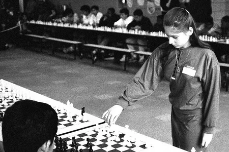 Judit Polgar is currently the only woman in the top 100 chess players in the world. Here, she is playing about a dozen other kids at chess. At the same time. She beat them all. 