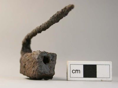 The front of one of the barb-spring padlocks recovered from the Pictish settlement at Lair in Glenshee, Scotland