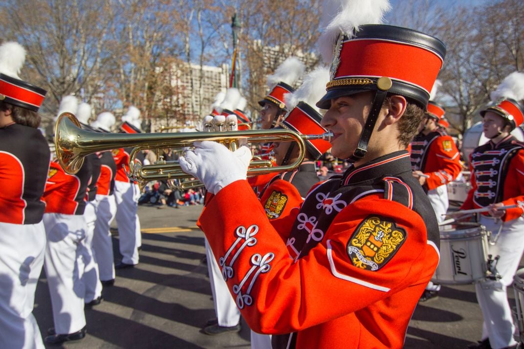 2 - A cheery trumpeter marches along Benjamin Franklin Parkway in Philadelphia during a Thanksgiving Day parade.