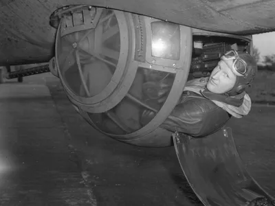 The ball turret, like this one on a B-17 in England in 1943, was designed small to reduce drag, so its gunner usually was the shortest man in the crew.