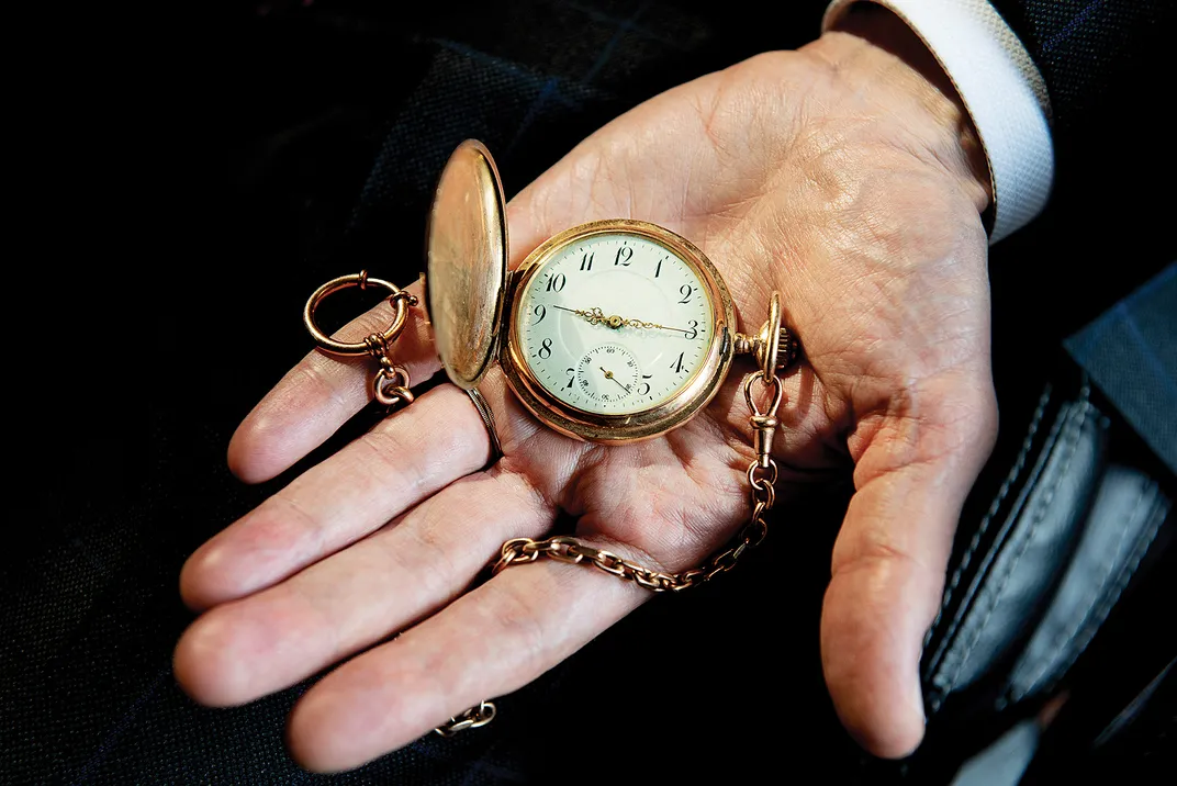 Loeb today, holding the gold pocket watch