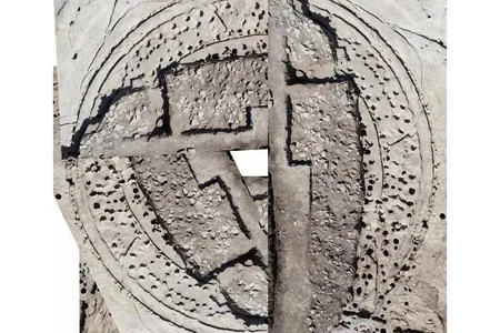 Archaeologists have excavated about one-third of the 66-foot wide timber circle, shown on the right. The other portion of this composite image draws on an aerial photograph to give a sense of the structure's size. 