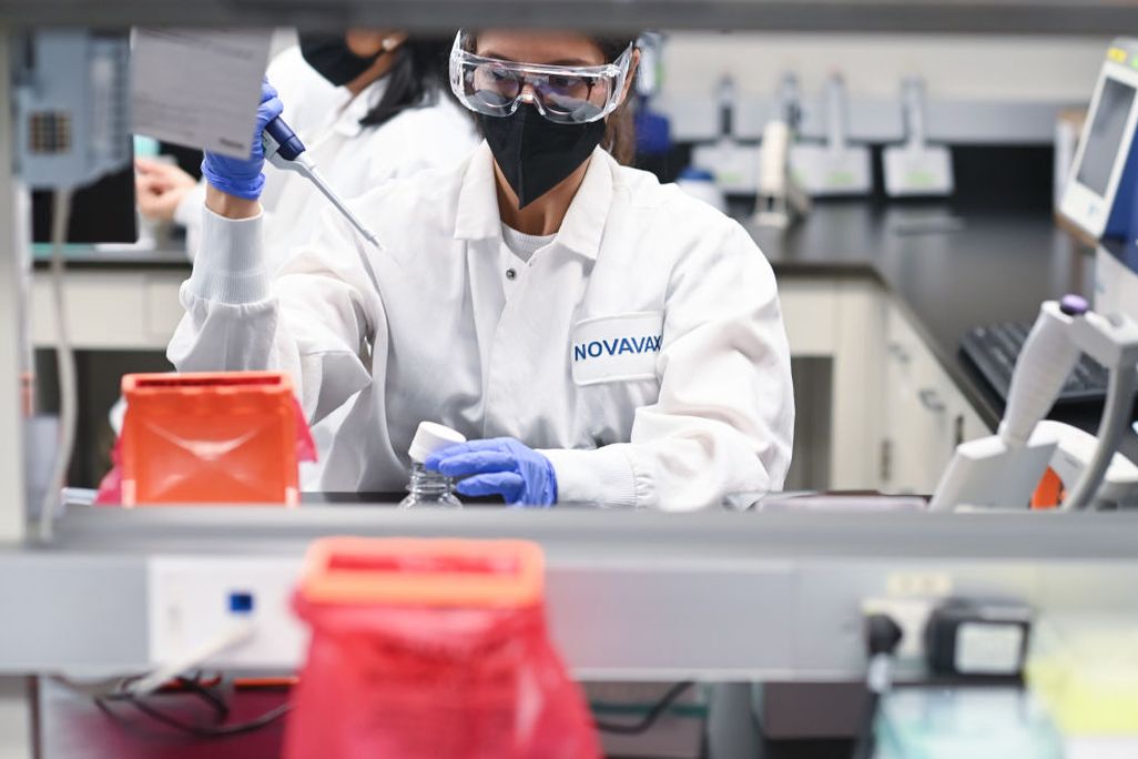 An image of a woman working in a Novavax laboratory