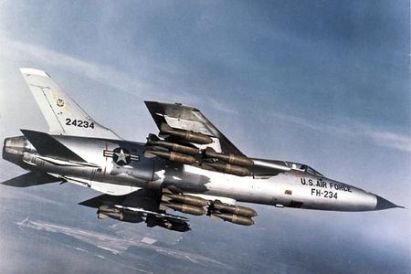 During a flight demonstration Stateside, an F-105 carries a full bomb load: 16 750-pounders. While attacking targets in Vietnam, though, Thuds were generally outfitted with 6,000 pounds of bombs and two auxiliary fuel tanks.