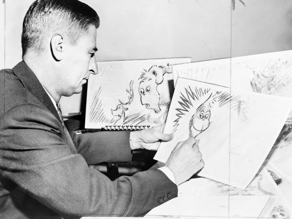 Dr. Seuss drawing the Grinch