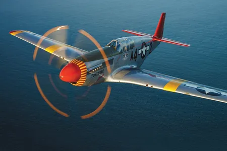 The author at the controls of the Commemorative Air Force’s P-51C.