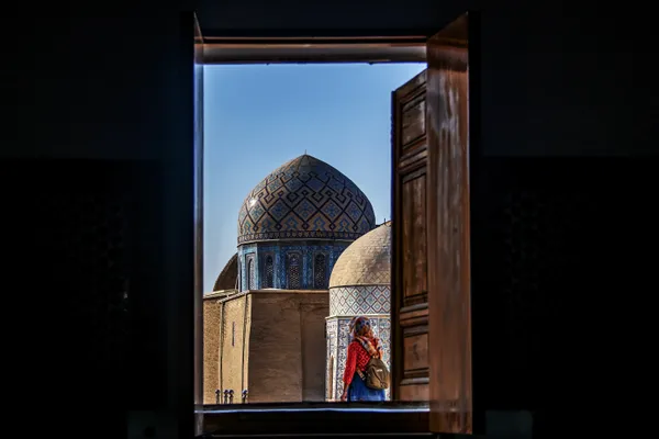 Passers by outside the gate thumbnail