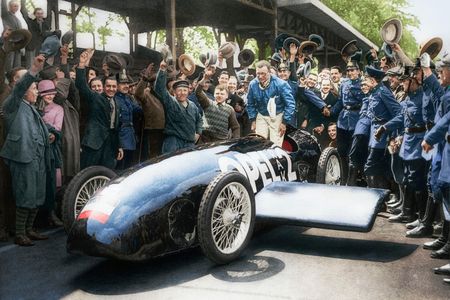 Fritz von Opel celebrates a run in his RAK-2 rocket car in Berlin on May 23, 1928. He had the original black-and-white image colorized.