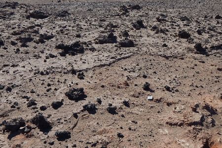 Chemical analysis of&nbsp;the glass identified minerals only found in extraterrestrial rocks and minerals, such as cubanite, troilite, pyrrhotite lath, or calcium-aluminum-rich inclusions.&nbsp;These minerals were also found in dust collected from the Wild-2 comet in 2004 by NASA during the Stardust mission.