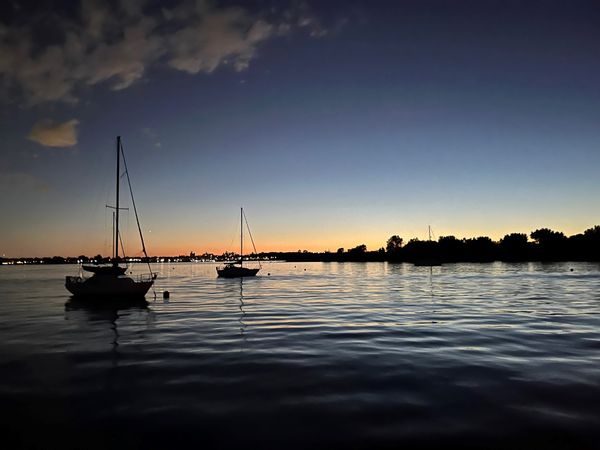Sailboats at sunset in New York. thumbnail