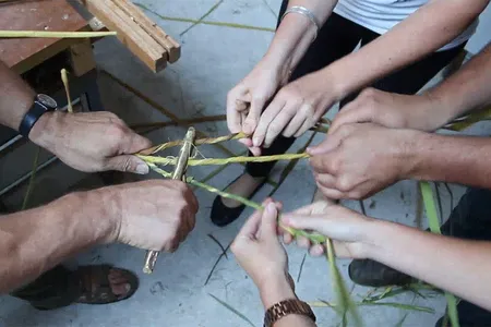 In the lab, archaeologists showed how they could rapidly produce thick rope by threading cattail fibers through a replica of a Stone Age tool.