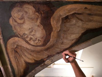 Painted around 1730, the angels were covered up in 1912.