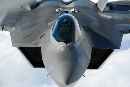 An F-22 Raptor pilot lines up his aircraft March 31, 2011, to be refueled by a KC-135 Stratotanker. (U.S. Air Force photo)