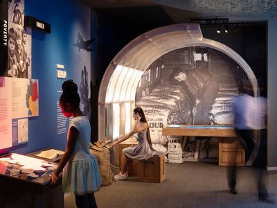 Visitors explore during a sneak preview of the newly renovated Harry S. Truman Presidential Museum and Museum in Independence, Missouri. The $29 million expansion took 2 years to complete. 
