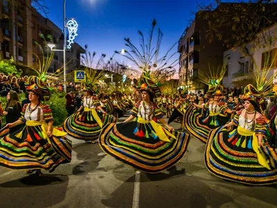 The parade in Navalmoral de la Mata starts in the afternoon but lasts well over three hours, ushering revelers into the dusk.

