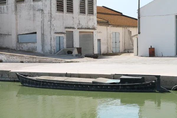 Docked vessel near industrial edge, La Albufera .Valencia thumbnail